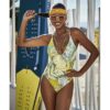 Bañador amarillo Selmark BM557 con escote profundo y aros, ideal para realzar el busto con estilo sofisticado y moderno para el verano.