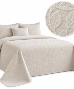 Colcha dormilona Paina de Cañete en color beige, con elegante diseño floral en relieve para vestir la cama con estilo y aportar calidez al dormitorio.