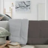 Nórdico Icelands California de 350 g bicolor en gris oscuro y gris perla, ideal para vestir la cama con calidez y estilo moderno.